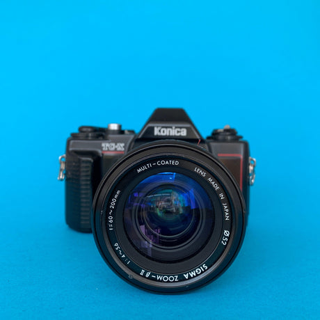 Konica TG-X 35mm SLR Film Camera w/ 60mm - 200mm Zoom Lens