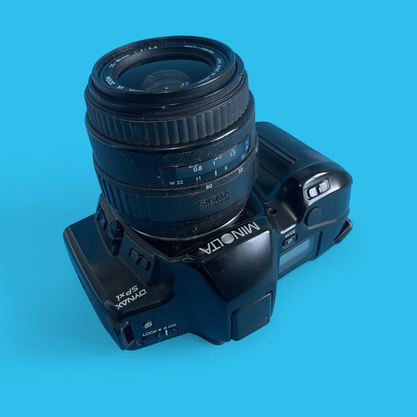 Minolta Dynax SPxi Automatic 35mm SLR Film Camera w/ Auto Zoom Lens