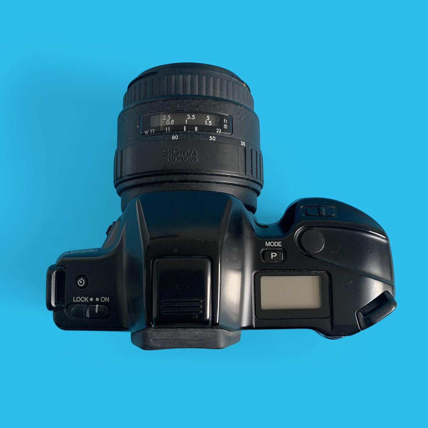 Minolta Dynax SPxi Automatic 35mm SLR Film Camera w/ Auto Zoom Lens