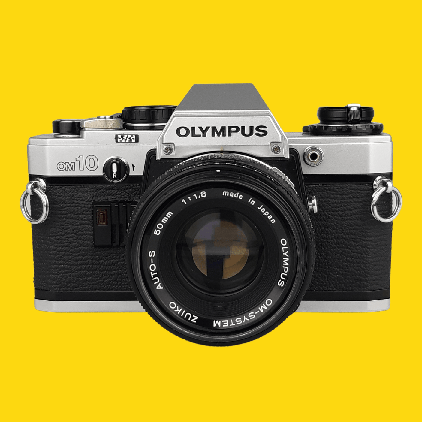 Olympus OM10 35mm SLR Film Camera w/ 50mm f/1.8 lens, Lens Cap, Leather Case & Filter