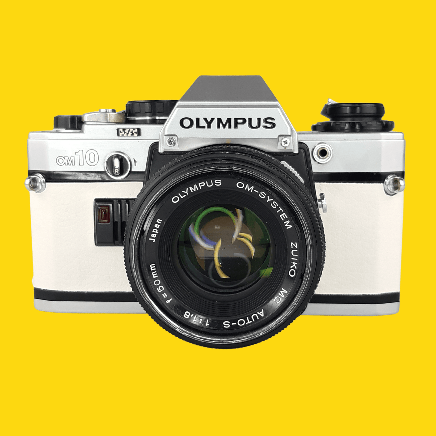 Olympus OM10 White Leather Vintage 35mm Film Camera w/ F/1.8 50mm Lens