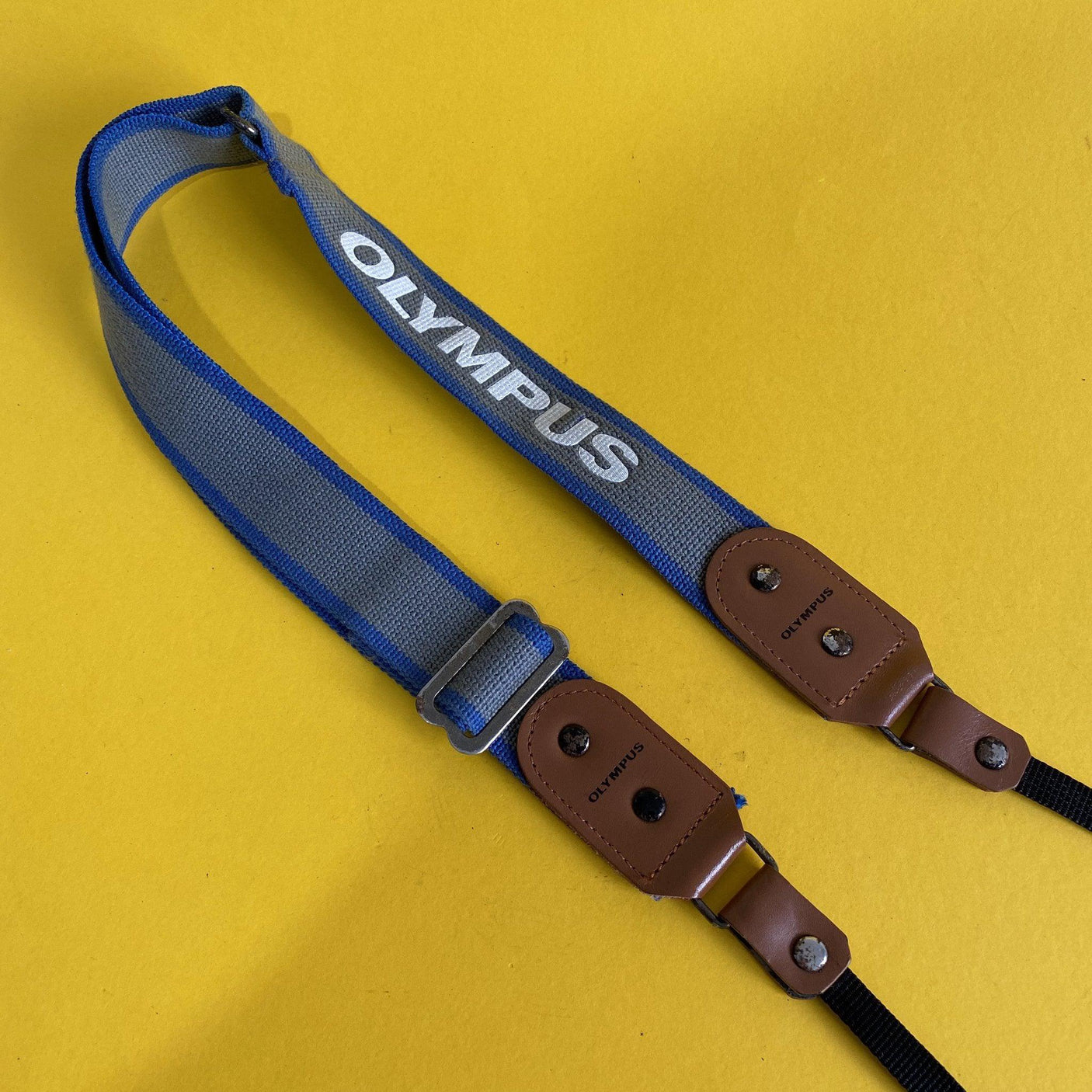 Original Olympus Blue and Grey SLR Camera Strap with Brown Leather Clasps