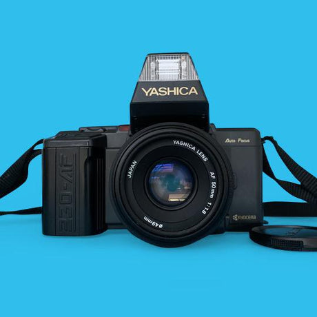 Yashica 230-AF Auto 35mm Film Camera w/f1.8 50mm Lens and Flash