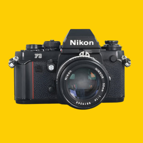 Nikon camera on a gray background
