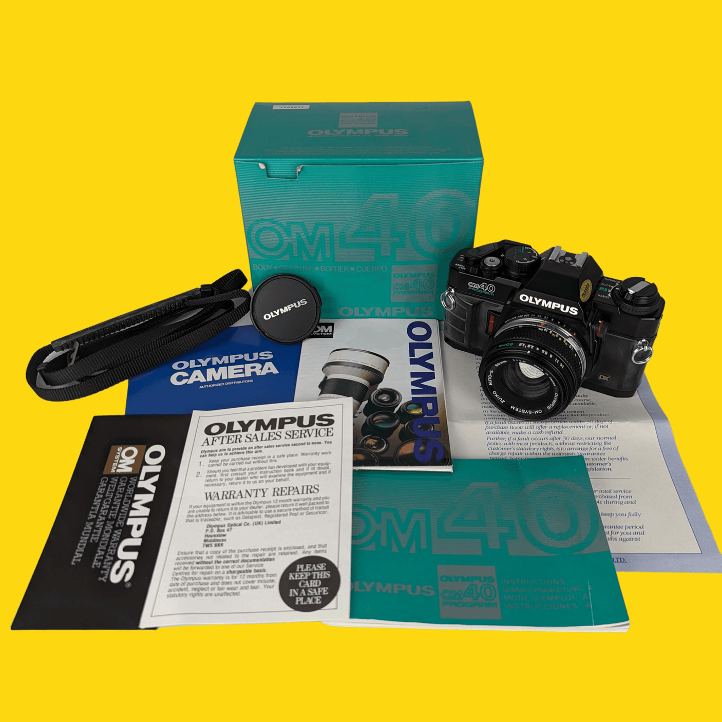 BRAND NEW - Olympus OM40 Program Black 35mm SLR Film Camera with Olympus Prime Lens