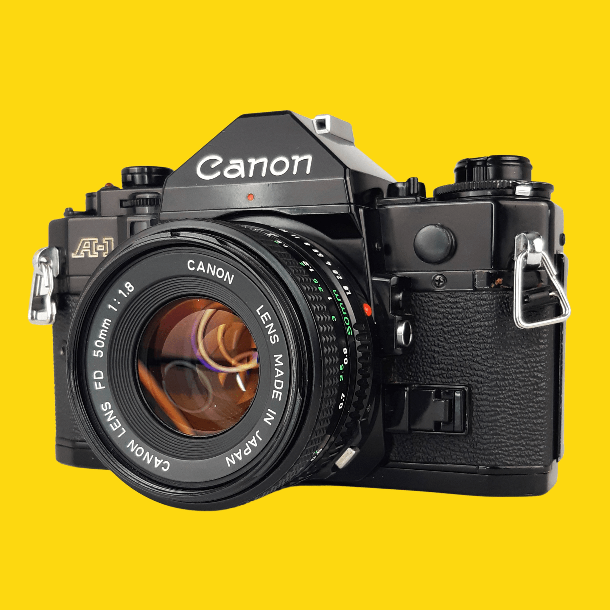 美品 Canon A-1 + New FD NFD 50mm f1.8 - フィルムカメラ