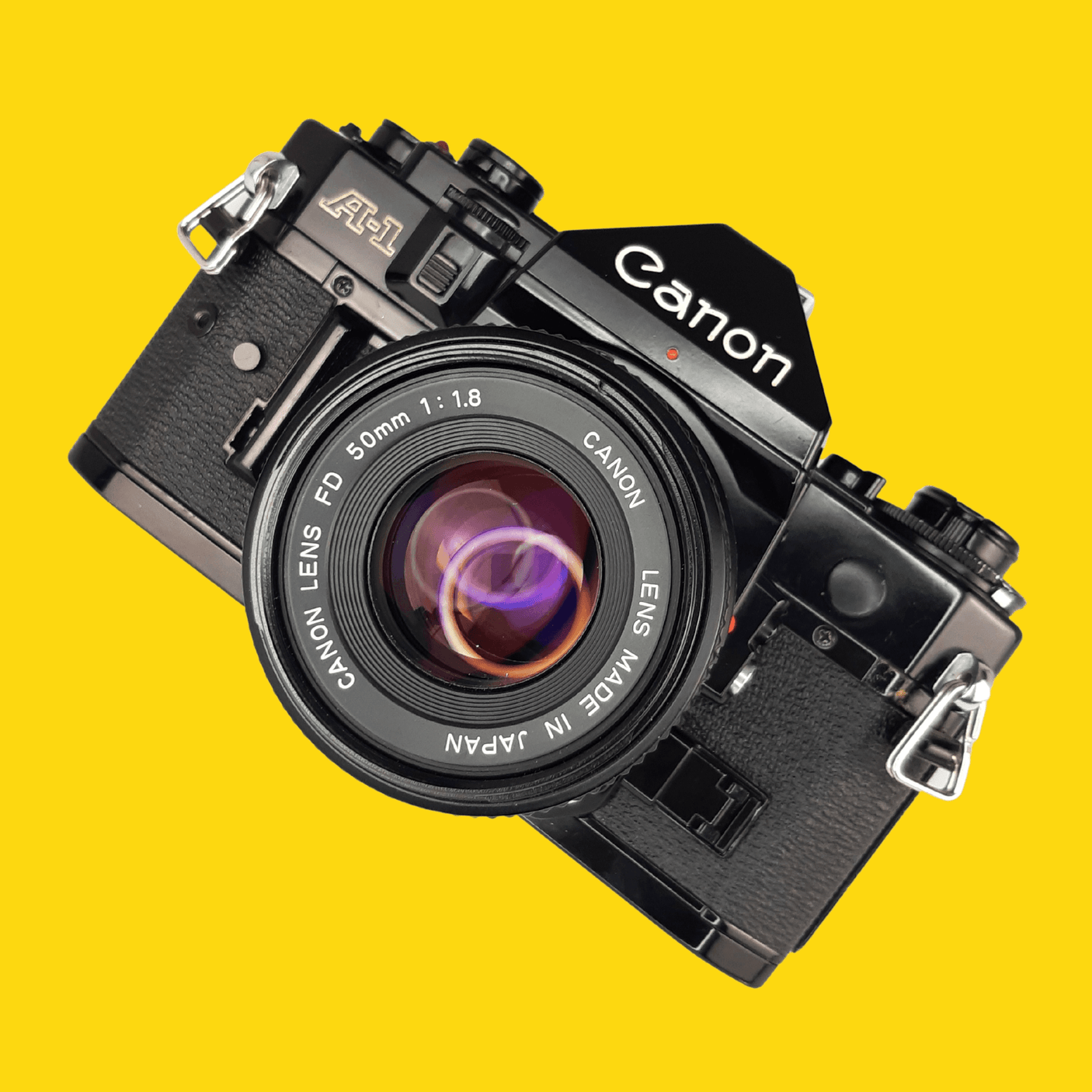 Canon A-1 ビンテージ SLR 35mm フィルム カメラ、f/1.8 50mm プライム 