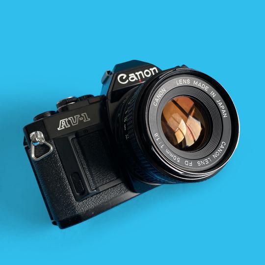 Canon AV 1 Black Vintage 35mm SLR Film Camera with Prime 50mm Lens