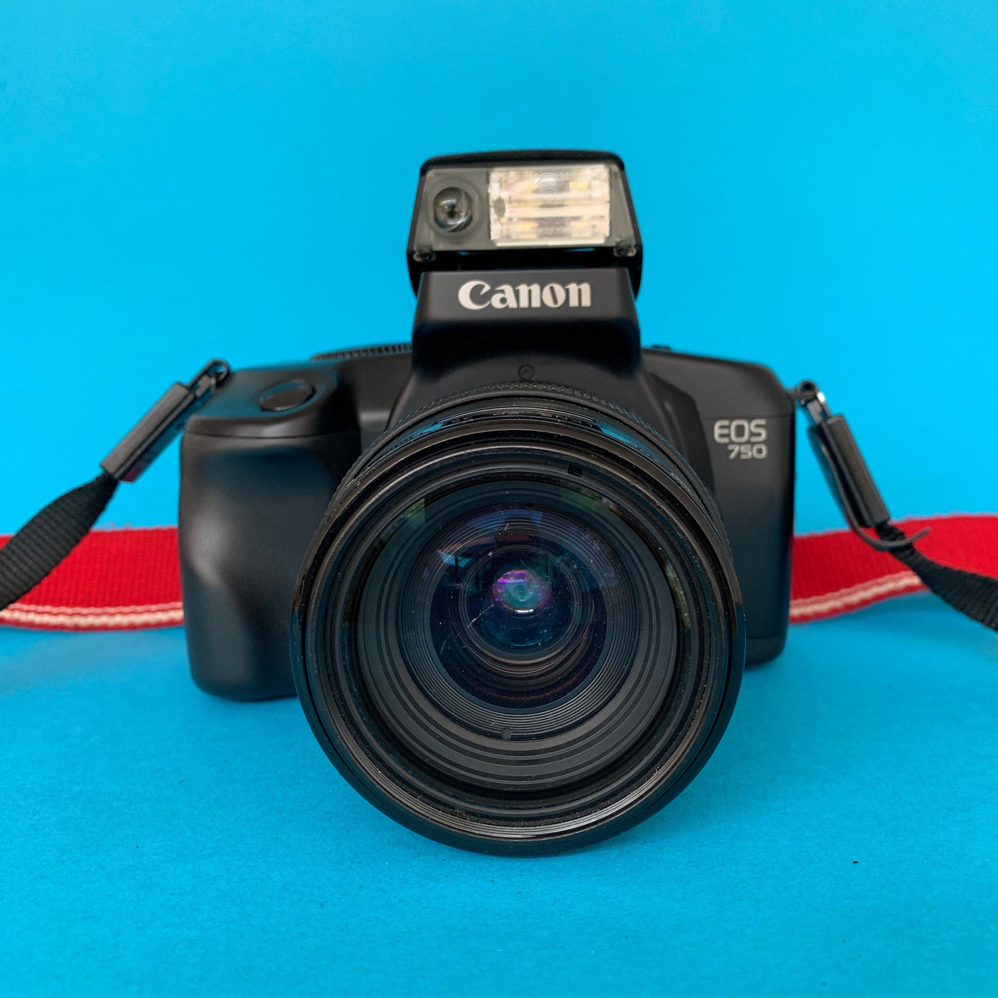 Canon EOS 750 Fully Auto SLR 35mm Film Camera with 35mm-105mm Zoom Lens