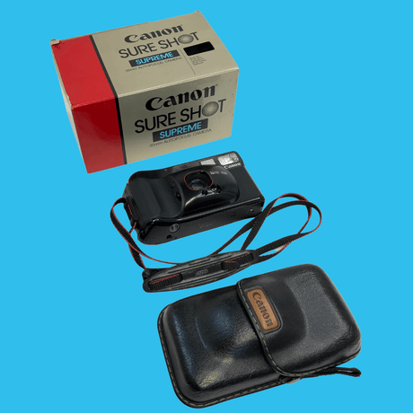 Canon Sure Shot Supreme 35mm Film Camera Point and Shoot with Black Leather Canon Case and ORIGNAL BOX