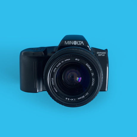 Minolta Dynax SPxi Automatic 35mm SLR Film Camera w/ Auto Zoom Lens