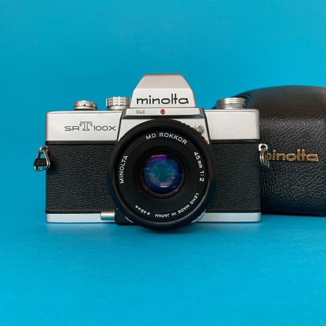 Minolta SRT100X 35mm SLR Film Camera w/ Prime Lens & Original Leather Case