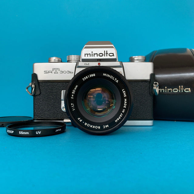 Minolta SRT303b 35mm SLR Film Camera w/ Prime Lens & Original Leather Case