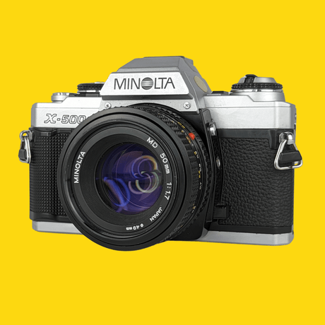 Minolta X-500 SLR 35mm Film Camera with Auto Zoom Lens