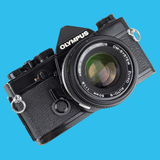 Olympus OM 1 Black Vintage 35mm SLR Film Camera with f/1.8 50mm Prime Lens