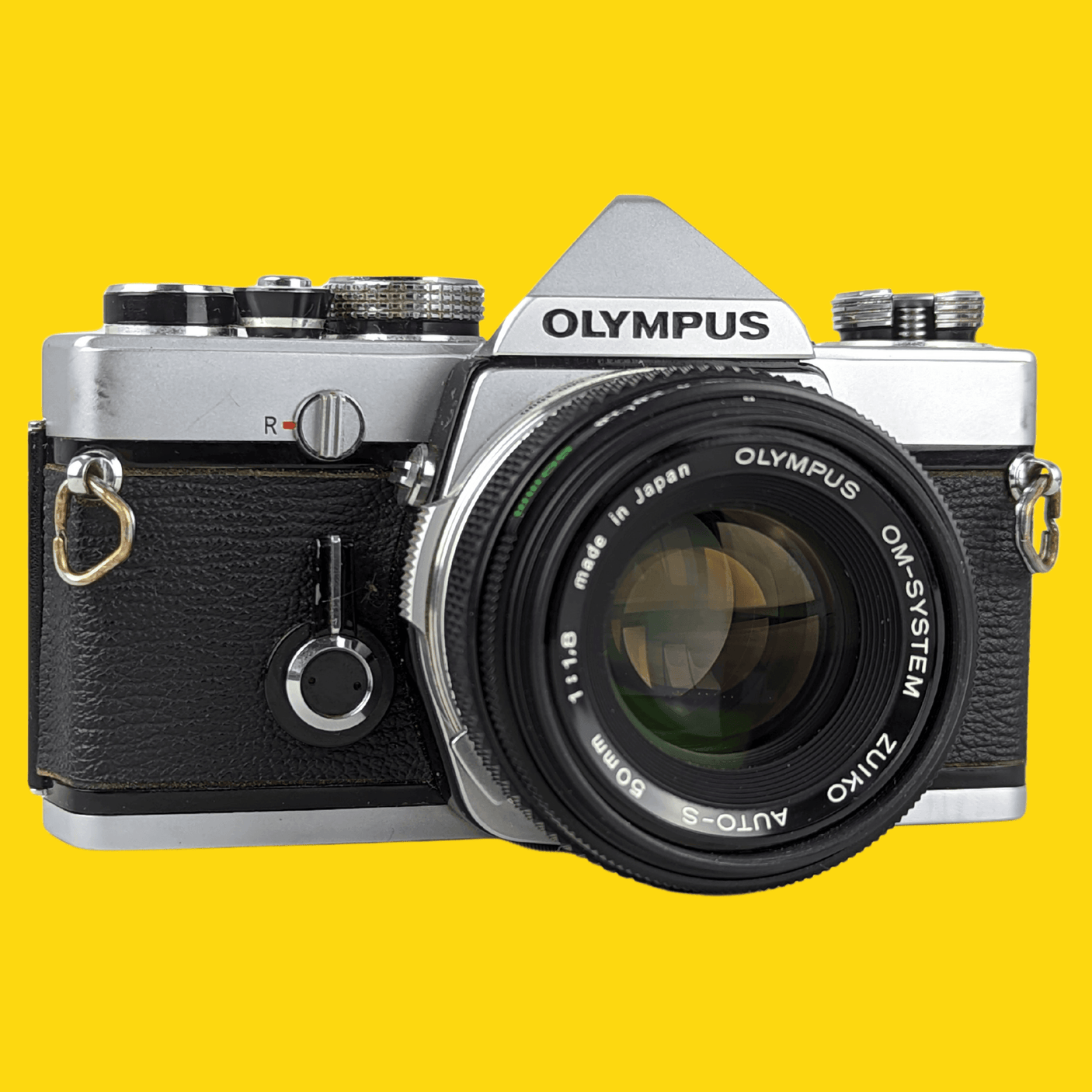 オリンパス OM 1 ビンテージ 35mm 一眼レフ フィルム カメラ、f/1.8 50mm プライム レンズ付き