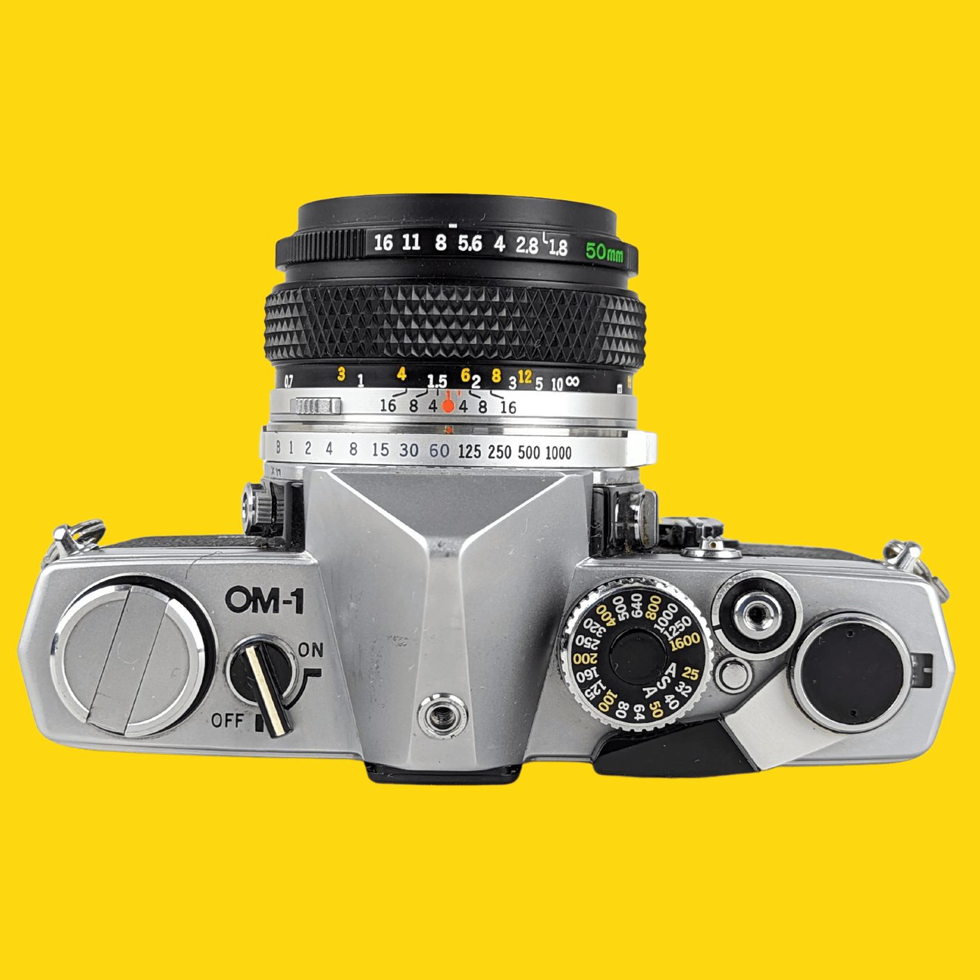 オリンパス OM 1 ビンテージ 35mm 一眼レフ フィルム カメラ、f/1.8 50mm プライム レンズ付き