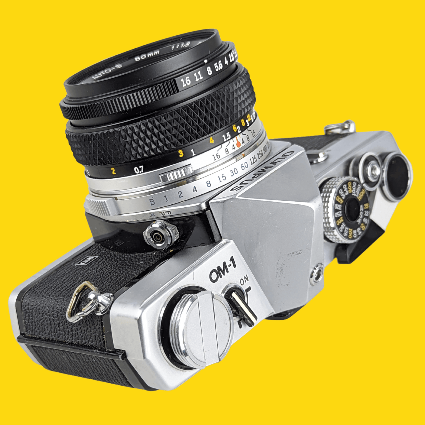オリンパス OM 1 ビンテージ 35mm 一眼レフ フィルム カメラ、f/1.8 50mm プライム レンズ付き