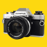 Olympus OM-10 Vintage 35mm Film Camera with F/1.8 50mm Lens
