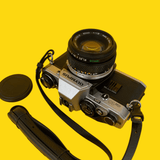 Olympus OM-10 Vintage SLR 35mm Film Camera with f/1.8 50mm Prime Lens