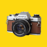 Olympus OM10 Brown Leather Vintage 35mm Film Camera w/ F/1.8 50mm Lens