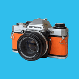 Olympus OM10 Orange Leather Vintage 35mm Film Camera w/ F/1.8 50mm Lens