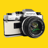 Olympus OM10 White Leather Vintage 35mm Film Camera w/ F/1.8 50mm Lens