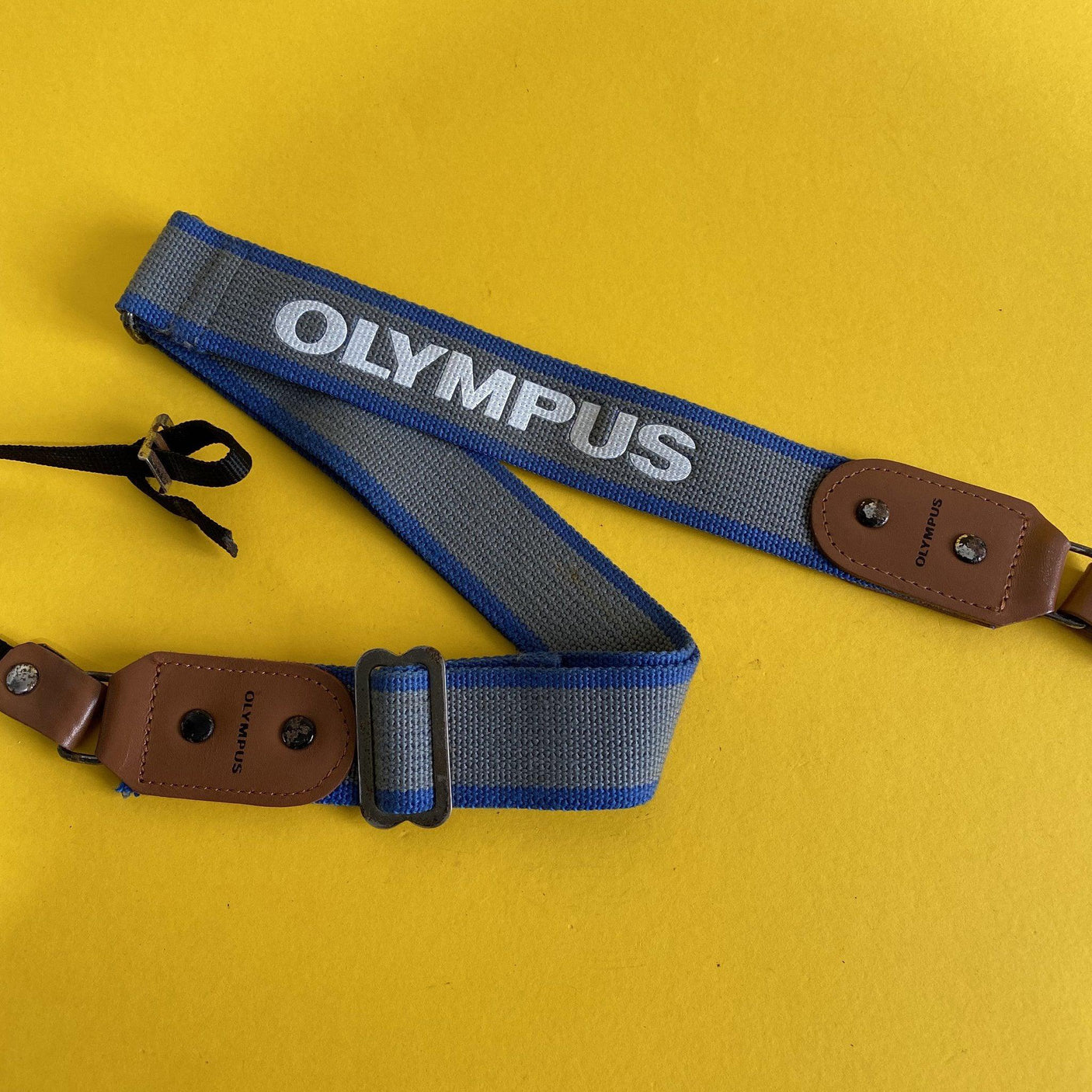 Original Olympus Blue and Grey SLR Camera Strap with Brown Leather Clasps