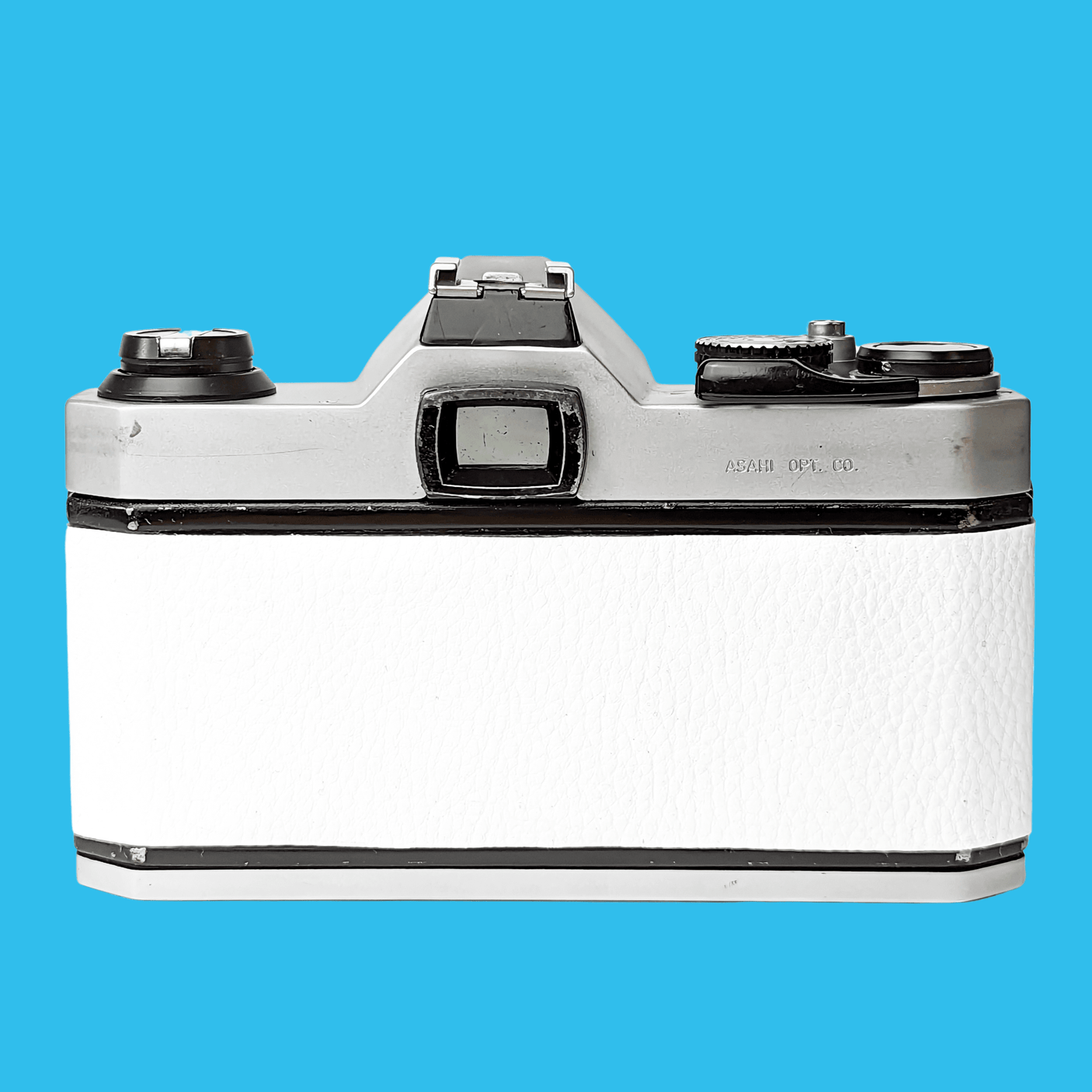 Pentax K1000 White Leather Vintage SLR 35mm Film Camera with Pentax f/2 50mm Prime Lens.