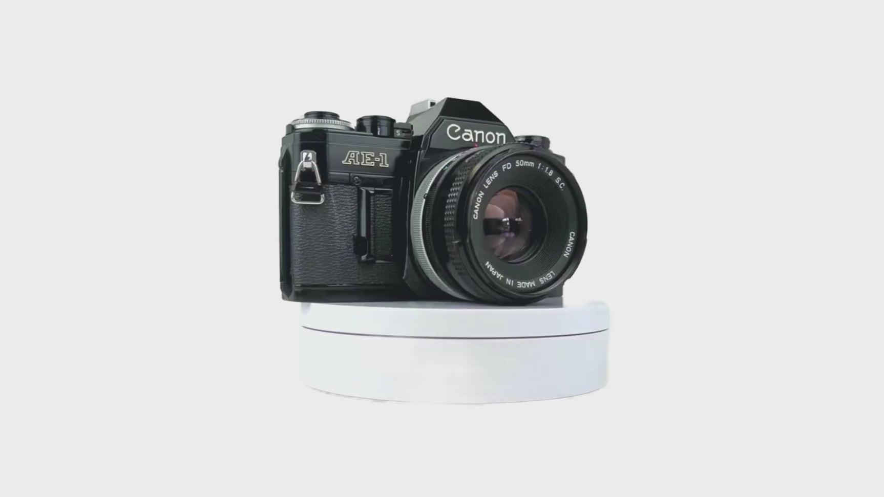 Canon AE-1 Black 35mm SLR Film Camera with Canon Prime Lens - Film Camera Store