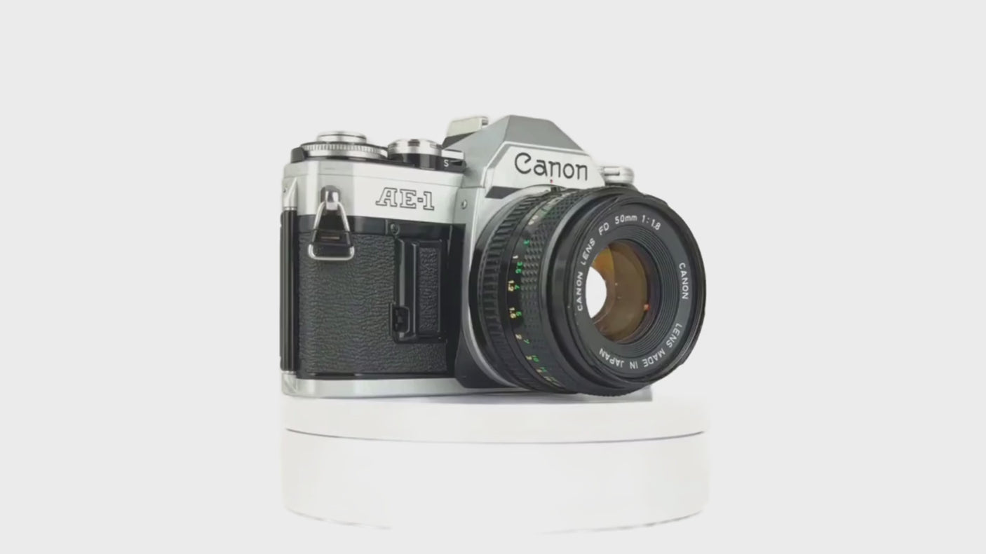 Canon AE-1 35mm SLR Film Camera w/ Canon Prime Lens - Film Camera Store